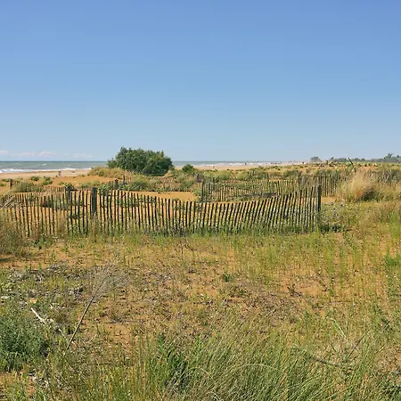 Апартаменты Cozy Flat With Private Garden Next To The Sea Бибионе